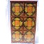 Der tibetanische Schrank ist aus Vollholz gefertigt und mit klassischen Motiven verziert.